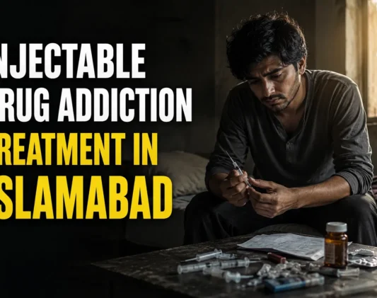 "Young Pakistani man struggling with injectable drug addiction during recovery treatment at a rehab centre in Islamabad."
