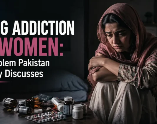 Drug addiction in women in Pakistan awareness image showing a distressed Pakistani woman sitting alone with prescription medication, highlighting the hidden impact of female substance abuse and the need for professional addiction treatment.